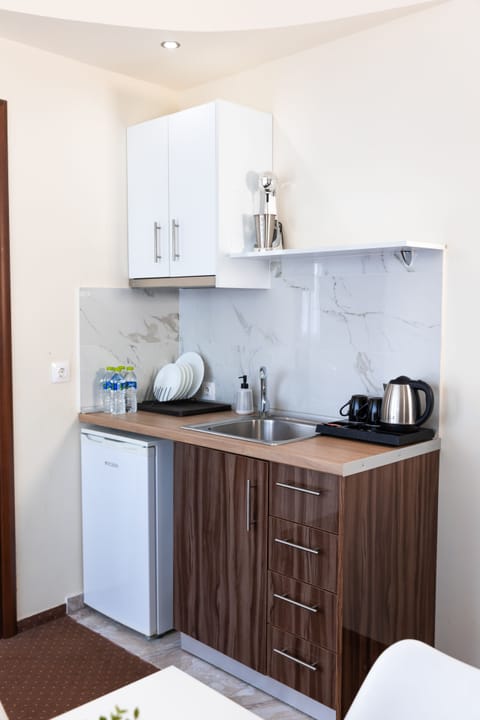 Apartment, 2 Bedrooms | Private kitchen | Fridge, electric kettle