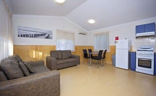 Standard 1 Bedroom Cabin | Living area | TV, DVD player