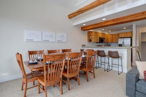 Gather around the welcoming dining table that seats 8 for a delicious meal