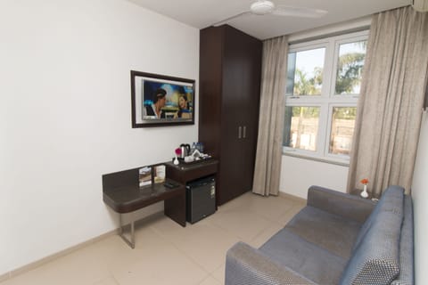 Junior Suite, 1 King Bed, Non Smoking | Living room | LED TV