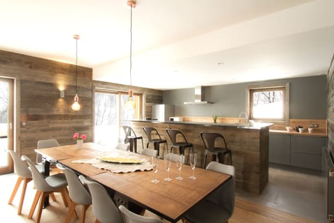 Loads of room at the dining table and the open-concept is always nice for the cook.