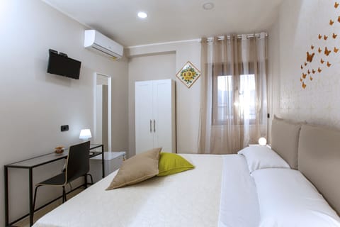 Standard Double Room (Girasole) | In-room safe, individually decorated, individually furnished, desk