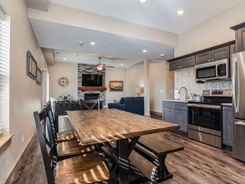 Lower level living area includes a spacious table for games