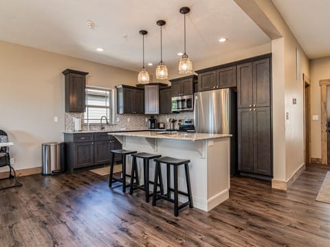 A beautiful kitchen area, with seating at the island!