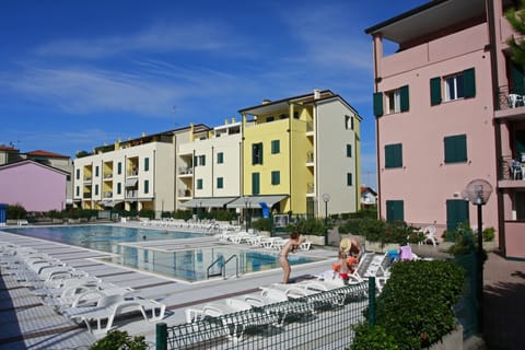 Seasonal outdoor pool, pool umbrellas, sun loungers