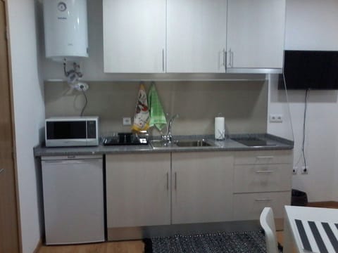 Deluxe Studio | Private kitchen | Full-size fridge, microwave, oven, stovetop