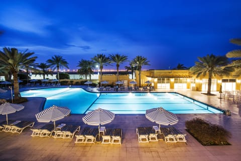 Outdoor pool, open 6:00 AM to 6:30 AM, pool umbrellas, sun loungers