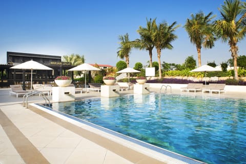 Outdoor pool, open 6:00 AM to 6:30 AM, pool umbrellas, sun loungers