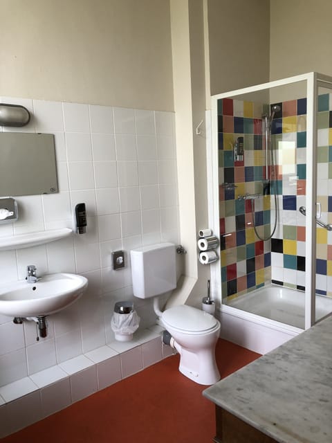 Family Triple Room | Bathroom | Shower, hair dryer, towels, soap