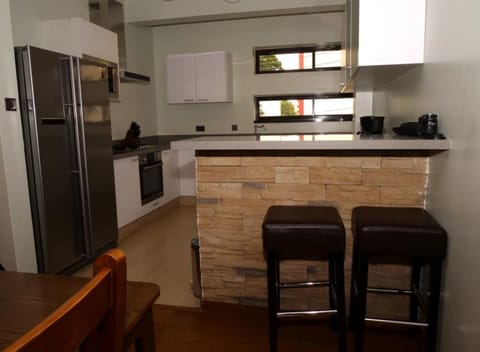 Apartment, Balcony | Private kitchen | Fridge, microwave, oven, stovetop