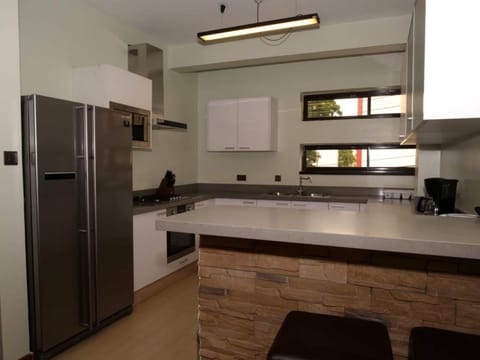 Apartment, Balcony | Private kitchen | Fridge, microwave, oven, stovetop