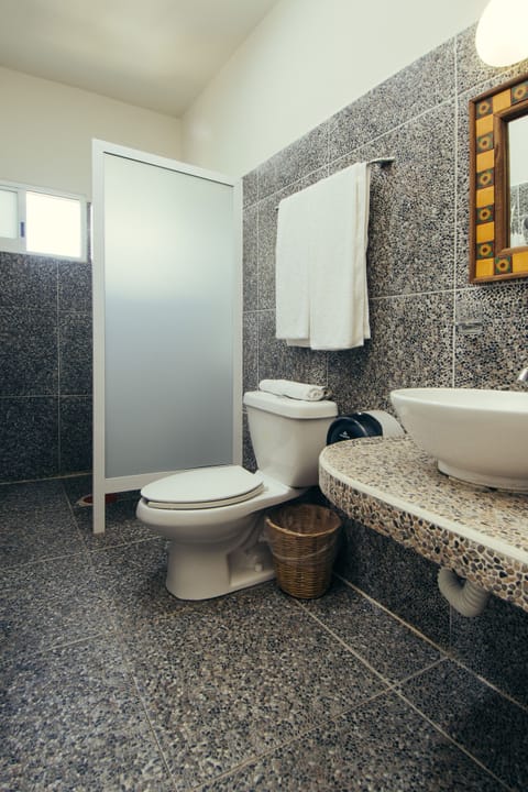 Apartment, 1 King Bed | Bathroom | Soap, shampoo, toilet paper