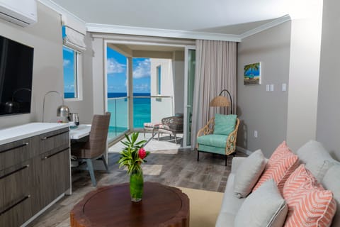 Luxury Suite, 2 Bedrooms, Balcony, Ocean View | Living area | 60-inch Smart TV with cable channels, TV, Netflix