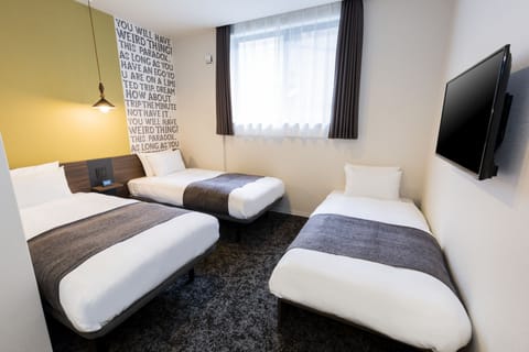 Twin Room with Sofa Bed | In-room safe, iron/ironing board, free WiFi, bed sheets