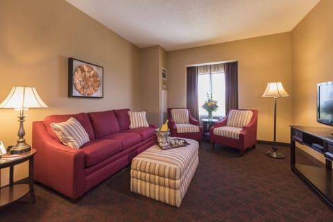 Suite, 1 King Bed (Executive Suite) | Living area | 32-inch flat-screen TV with cable channels, TV