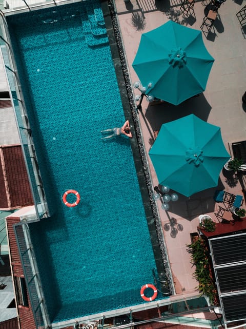 Outdoor pool, pool umbrellas, sun loungers