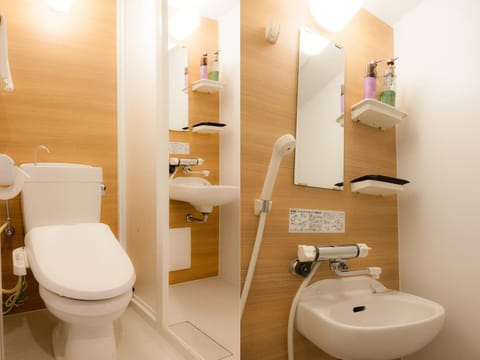 Twin Room (Check-in before 9PM) | Bathroom | Shower, free toiletries, hair dryer, slippers