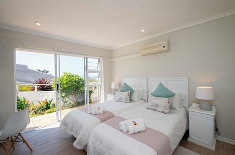 Twin bed room, sea and mountain views | Select Comfort beds, in-room safe, individually decorated