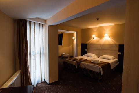 Junior Suite, 1 Bedroom | Minibar, in-room safe, desk, free WiFi