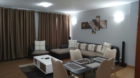Apartment, 2 Bedrooms | Living room | Flat-screen TV