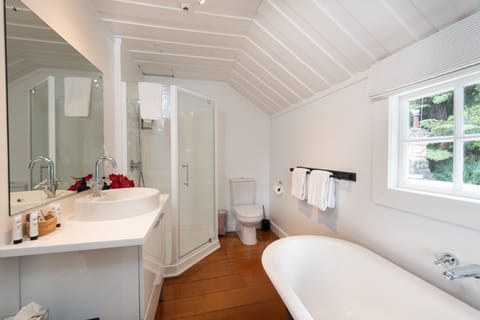 Ponga Suite | Bathroom | Designer toiletries, hair dryer, bathrobes, towels
