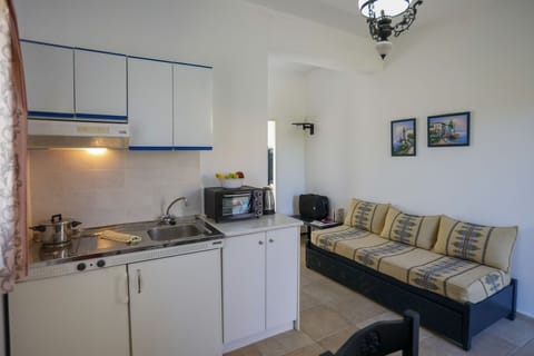 Apartment, 1 Bedroom | Living area | Flat-screen TV