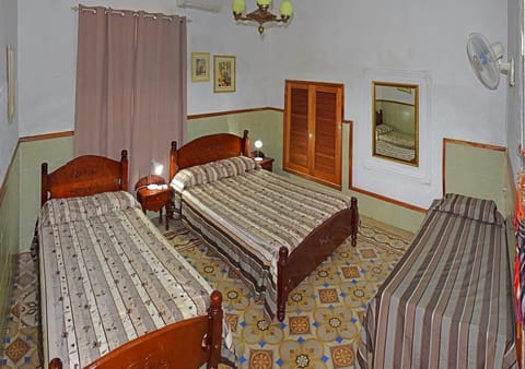 Comfort Quadruple Room | In-room safe, individually decorated, individually furnished