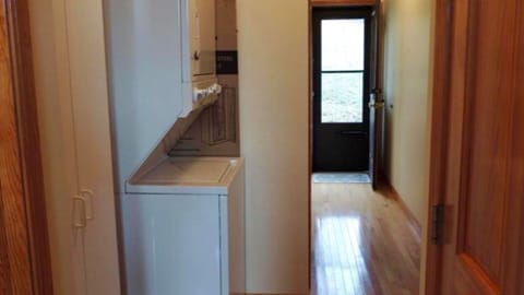 First floor easy access to stackable washer and dryer for guests