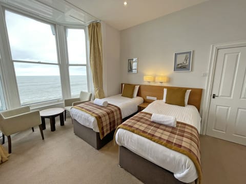 Twin Room, Sea Facing | Desk, iron/ironing board, free WiFi, bed sheets