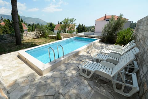 Outdoor pool, free cabanas, pool umbrellas