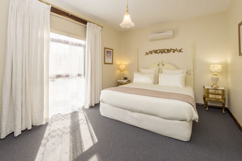 Deluxe Double Room (Provence) | Blackout drapes, iron/ironing board, free WiFi, bed sheets