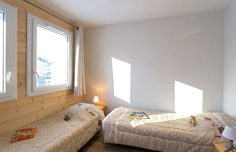 Get a good night's rest in the cozy bedroom which has 2 Single beds..
