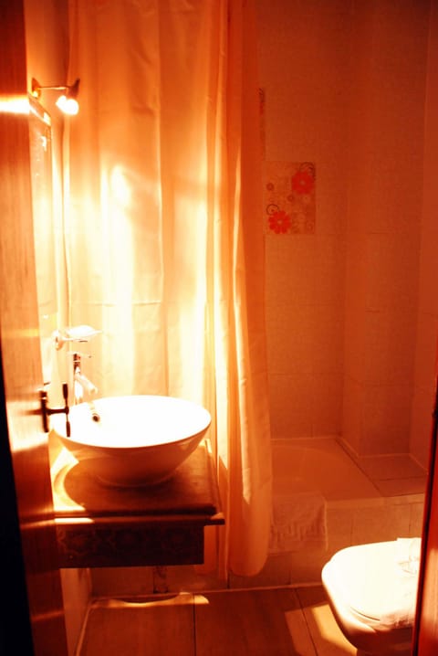 Quadruple Room | Bathroom amenities | Separate tub and shower, deep soaking tub, hair dryer, towels