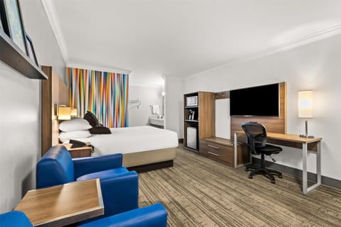 Desk, laptop workspace, blackout drapes, iron/ironing board