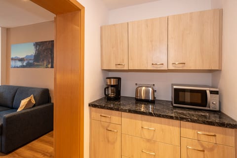 Panoramic Apartment, Allergy Friendly, Mountain View | Private kitchen | Full-size fridge, electric kettle, highchair