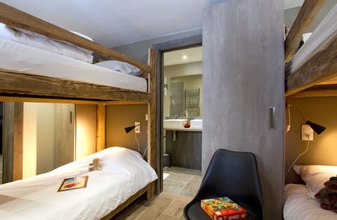 One of the bedrooms has 2 sets of Bunk beds.