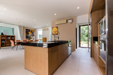 Luxury Villa | Private kitchen | Full-size fridge, microwave, oven, stovetop