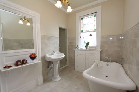 Room, 1 King Bed, Fireplace (Victorian Room) | Bathroom | Hair dryer, bathrobes, towels