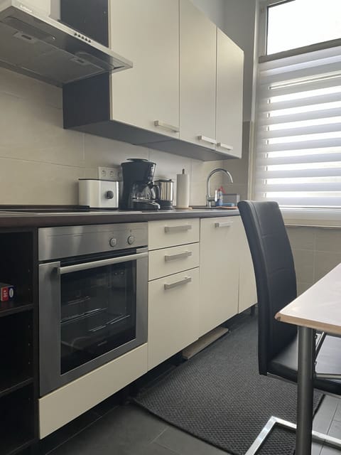 Apartment, 3 Bedrooms (Nordmann) | Private kitchen | Full-size fridge, microwave, oven, stovetop