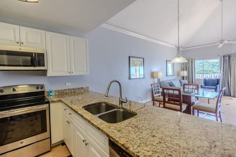 Suite, 1 Bedroom | Private kitchen | Fridge, microwave, stovetop, cookware/dishes/utensils