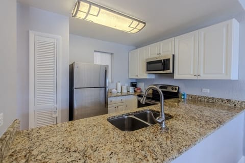 Suite, 1 Bedroom | Private kitchen | Fridge, microwave, stovetop, cookware/dishes/utensils