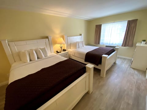 Executive Room, 2 Queen Beds, Kitchen | Blackout drapes, iron/ironing board, free cribs/infant beds