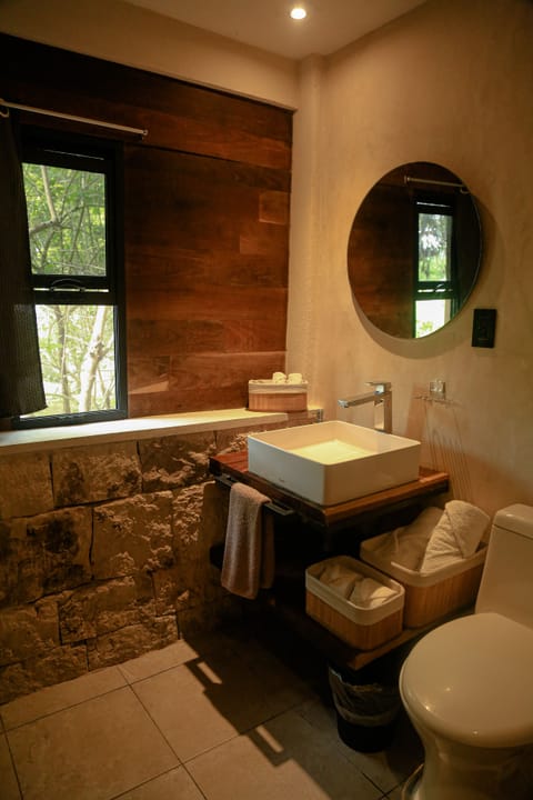 Design Quadruple Room | Bathroom | Eco-friendly toiletries, towels, soap, shampoo