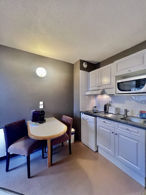 Mini-fridge, microwave, stovetop, espresso maker