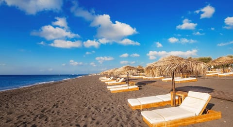 Beach nearby, black sand, beach towels