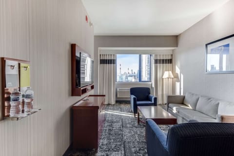 Executive Suite, 1 King Bed, Refrigerator & Microwave, City View (Walk-in Shower;with Sofabed) | Down comforters, pillowtop beds, in-room safe, laptop workspace