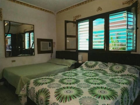 Triple Room (#2) | Minibar, individually decorated, individually furnished, blackout drapes