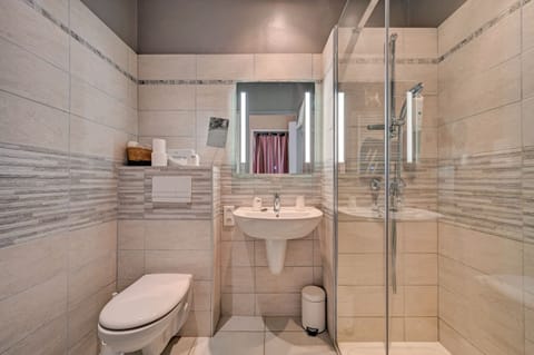 Premium Triple Room, Terrace | Bathroom | Shower, free toiletries, hair dryer, towels