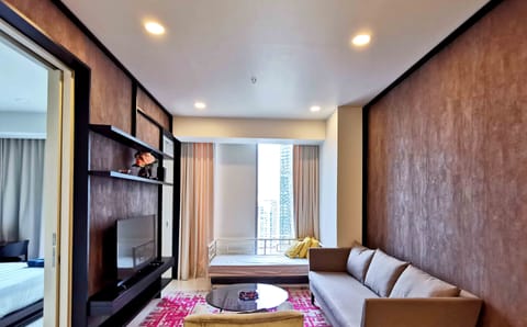1 Bedroom Spectacular Suite with KLCC View | Living area | LED TV