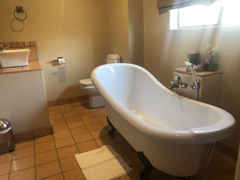 Luxury Suite | Bathroom | Designer toiletries, hair dryer, towels, soap